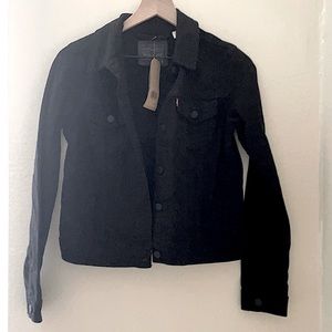 Levi’s brand new black jean jacket size S